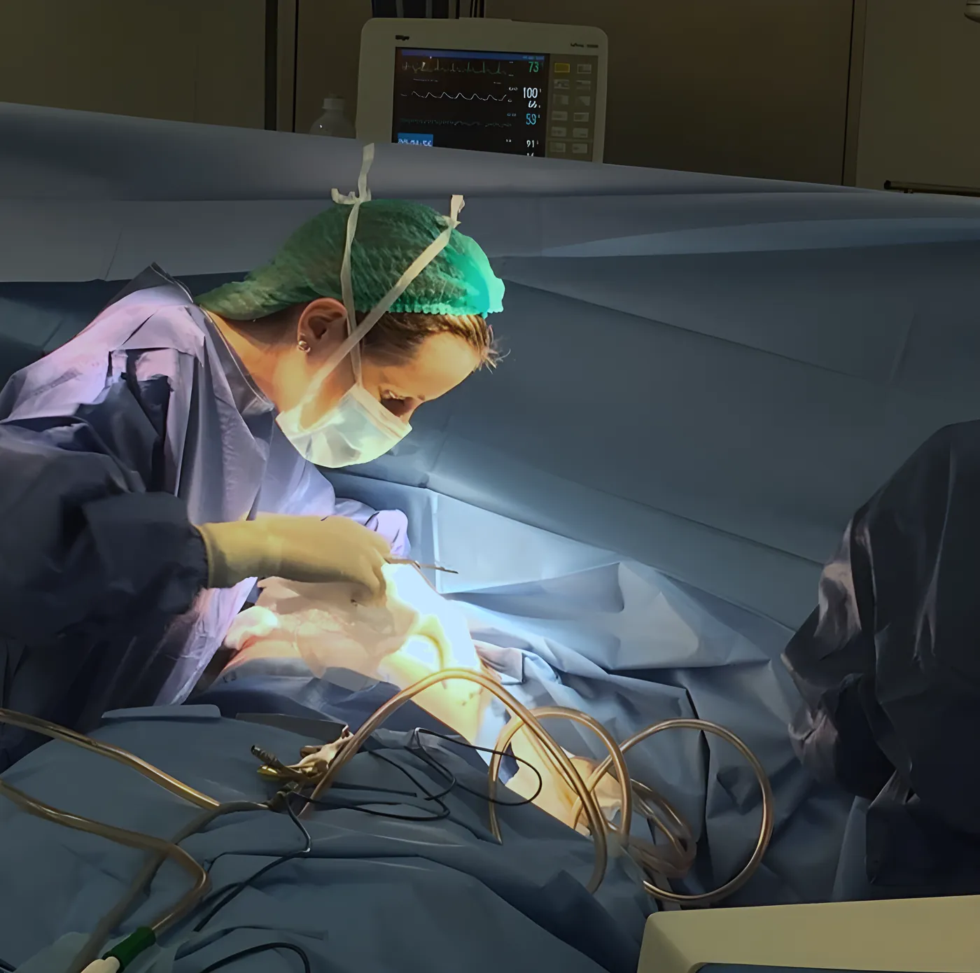 Plastic surgeon operating in a controlled surgical environment