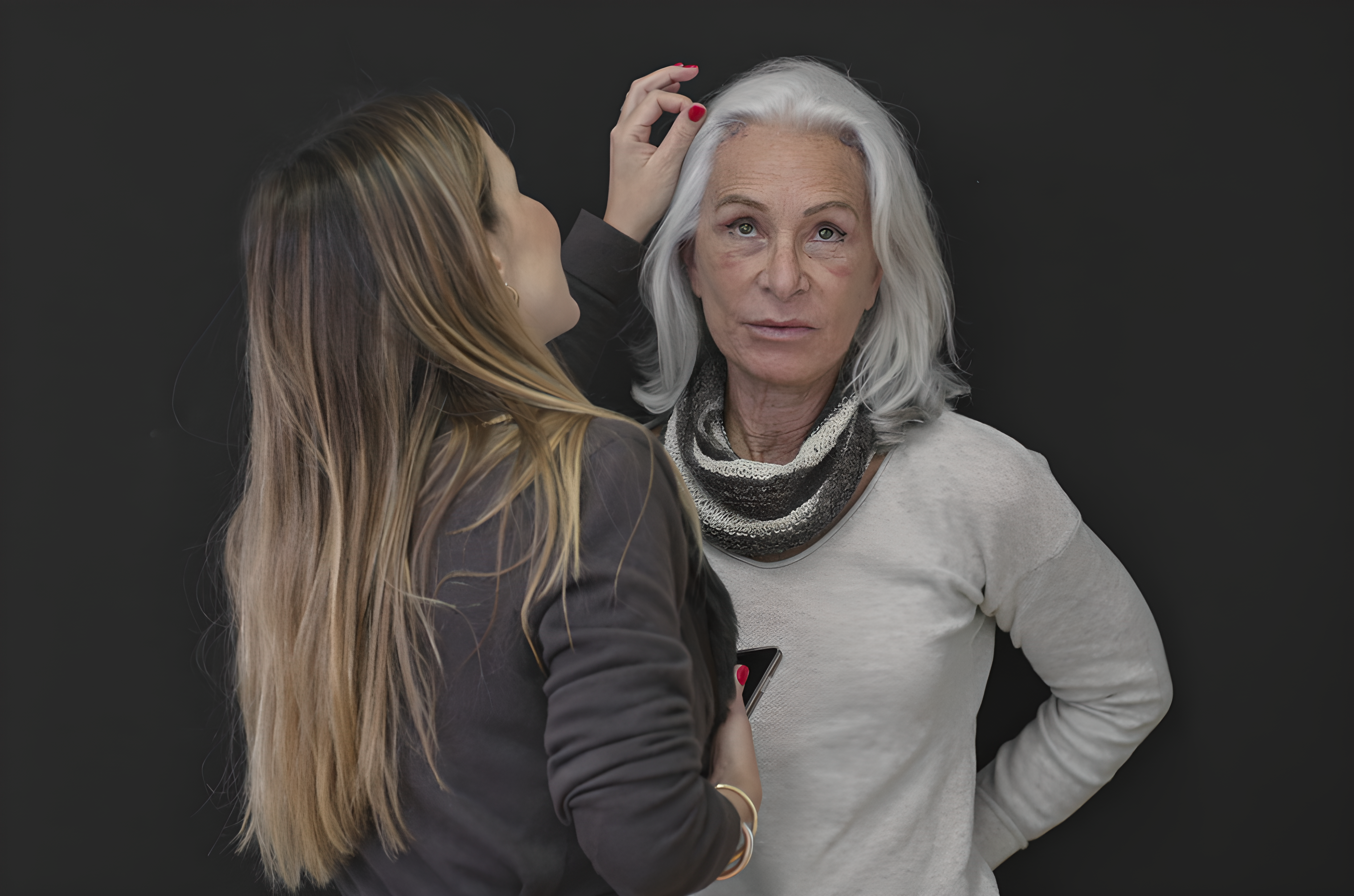 Plastic surgeon assessing a patient in a consultation setting