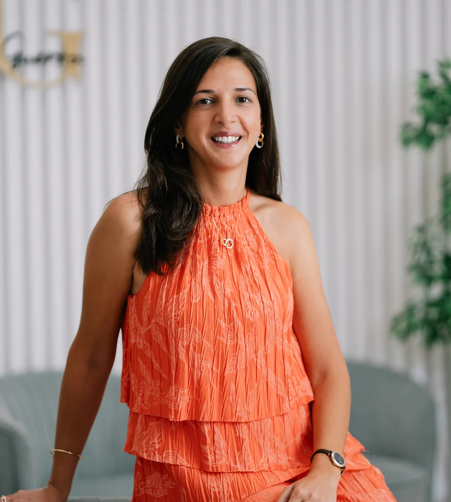Dr Iris Mortagua Brito standing inside the clinic