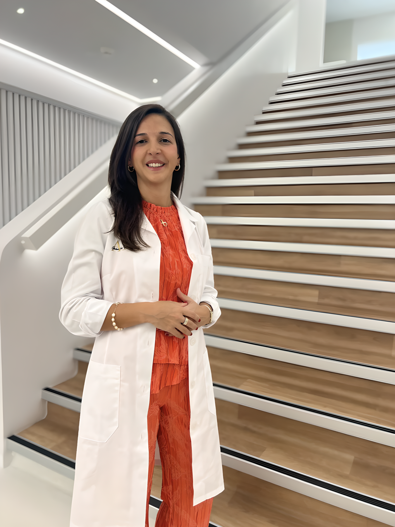 Dr Iris Mortagua Brito standing inside the clinic