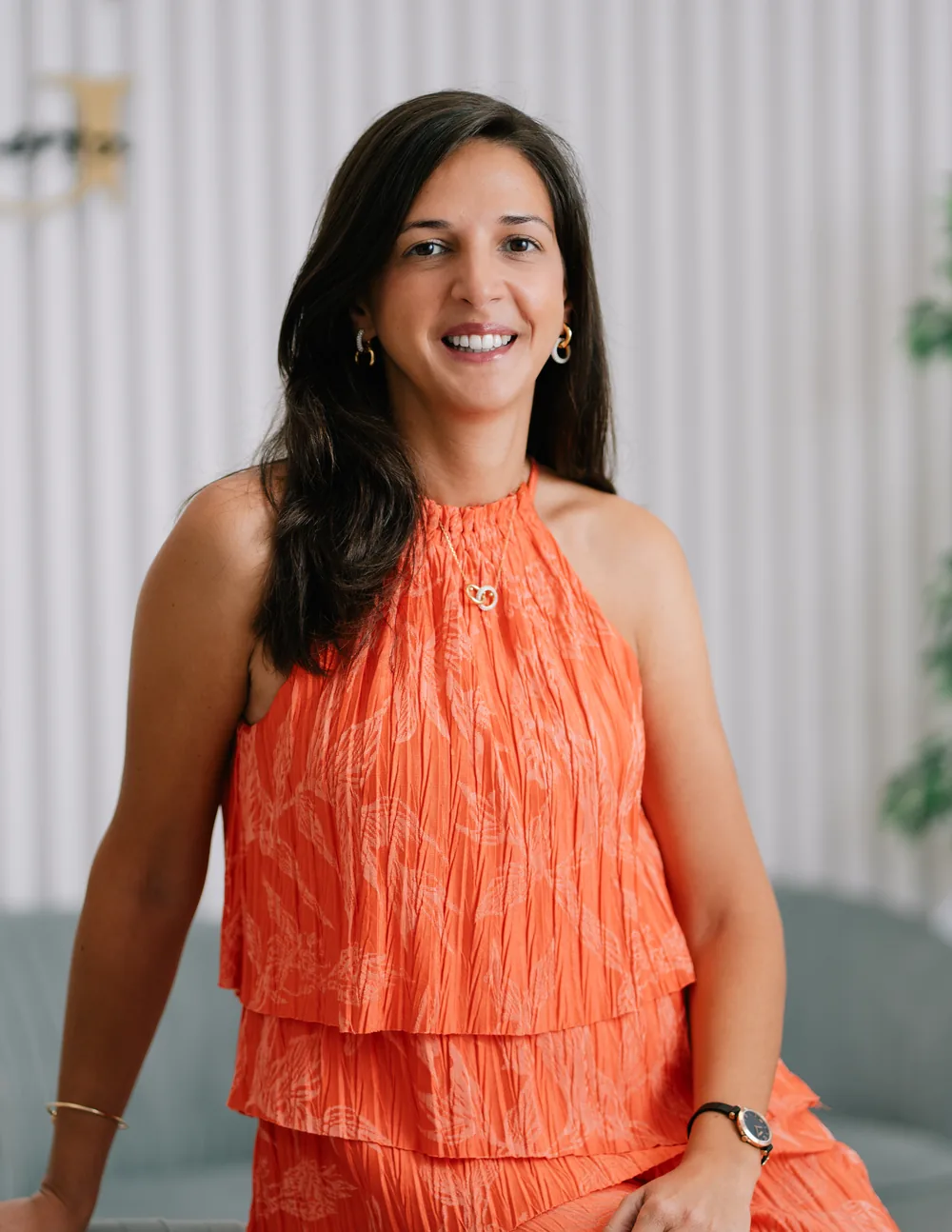Dr Iris Mortagua Brito standing inside the clinic